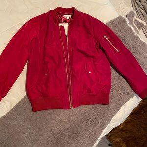 Beautiful cranberry red bomber jacket with gold zipper accents; new with tags